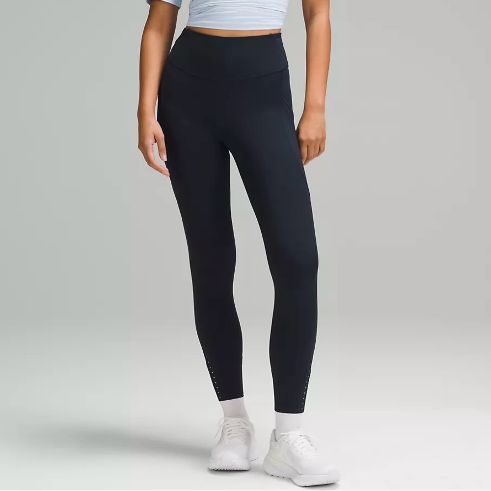 Lululemon Fast and Furious leggings. Navy. Size 6, 25”. Waist 27” hip 37”